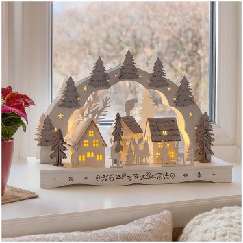 Leuchtbogen Dorf mit Tannen