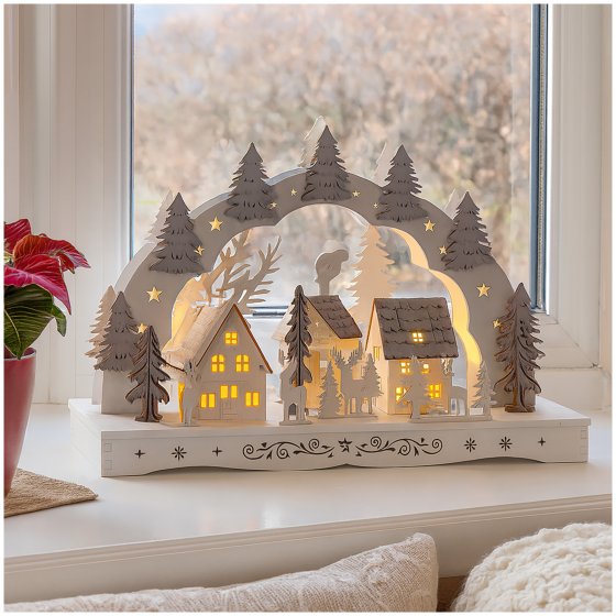 Leuchtbogen Dorf mit Tannen 