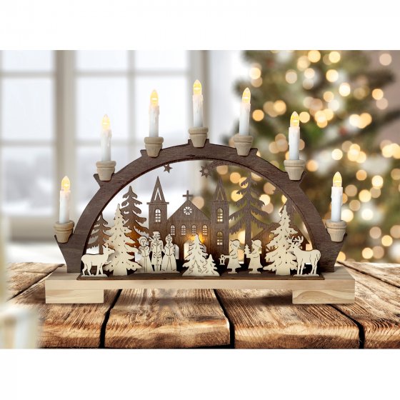 Leuchtbogen Sternensinger vor der Kirche 