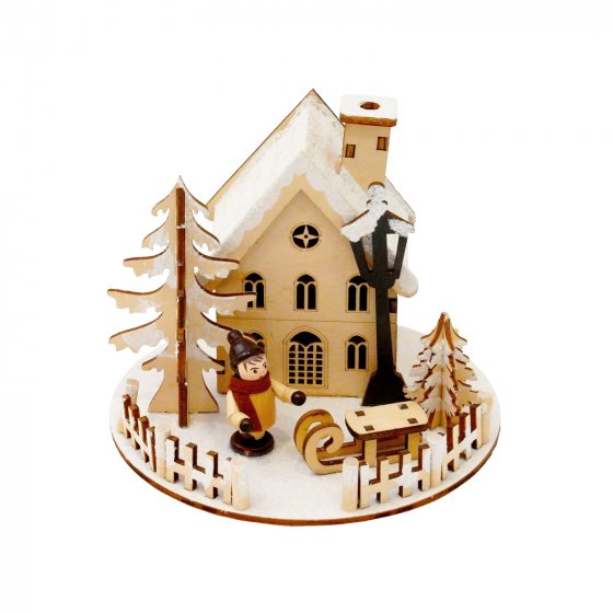 Weihnachtshaus LED beleuchtet mit Schlittenjunge 