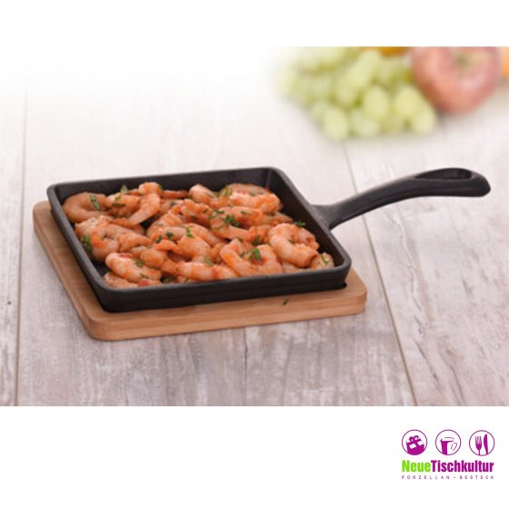 Tapasteller/Eisenpfanne mit Holzbrett 