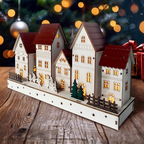 Weihnachtshäuser mit spielenden Kindern LED Winterdeko 