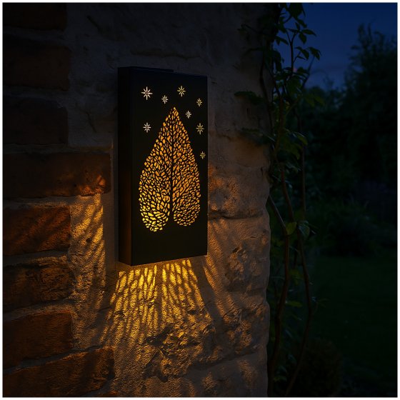 Wandleuchte aus Metall mit Schattenspiel Blattmotiv