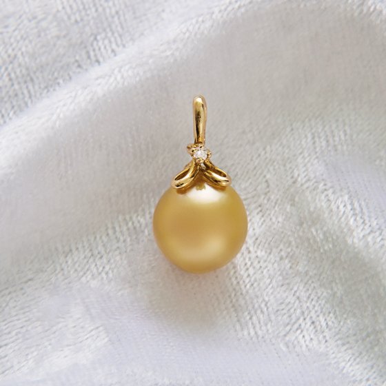Anhänger Goldene Perle mit Diamant 