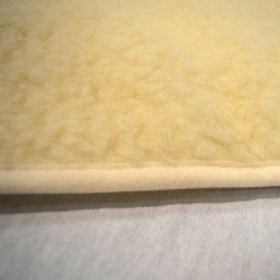 Lammflor-Spannauflage 