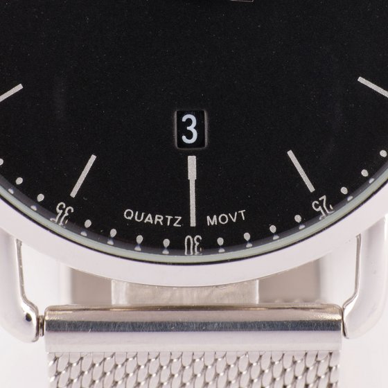 Silberne Milanaise-Uhr 
